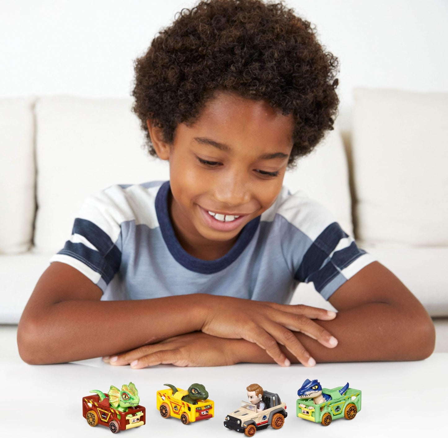 Hot Wheels RacerVerse, Set of 4 Car & Truck Play Vehicles with Jurassic World Characters as Drivers